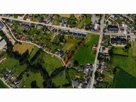 bouwgrond van 48 a 79 ca geschikt voor een open bebouwing