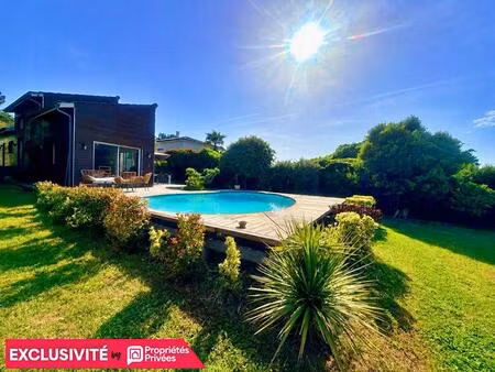 maison de caractère au style unique 125 m² 6 pièces avec piscine garage et vue nature à qu