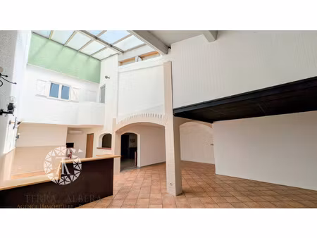 sorede rare bâtiment 200 m2 local com. + appart.