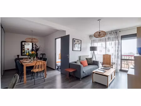 charmant appartement meublé de 66m2 avec balcon et parking -