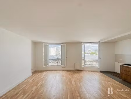 paris vie - a louer vide - saint placide - beau grand 3 pieces de 85 m2 - 5eme etage