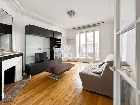 magnifique 2 pieces hausmannien avec balcon  ascenseur et cave