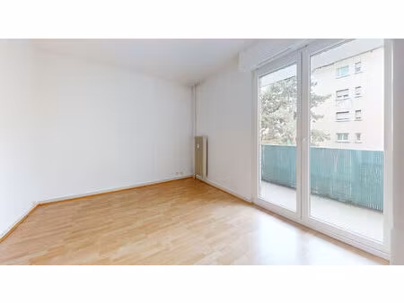 à louer : charmant appartement 2 pièces à mulhouse avec balcon et garage fermé en sous sol