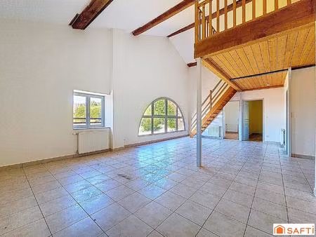 appartement de charme avec jardin privatif au cœur de chessy-les-mines