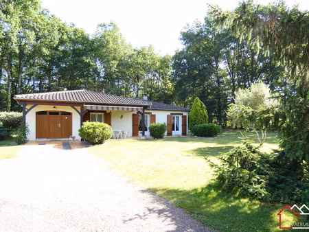 maison de plain-pied de 118 m² avec parc arboré entièrement c