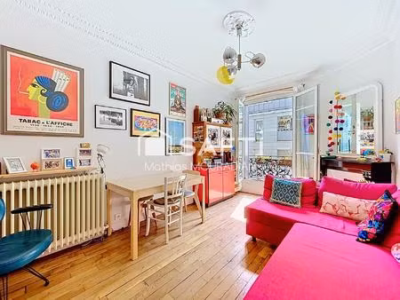 un appartement traversant plein de cachet  à deux pas de toutes les commodités.