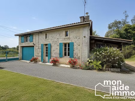 maison en pierre avec cachet et garages