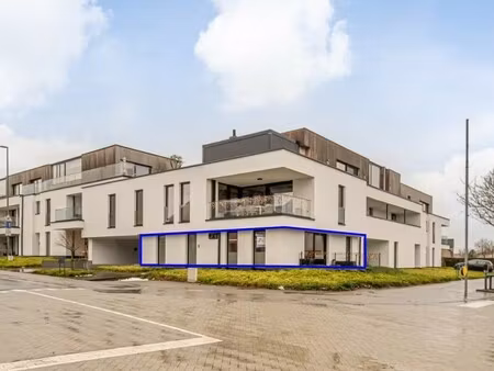 recent  gelijkvloers appartement in een stijlvolle residentie mét ondergrondse parkeerplaa