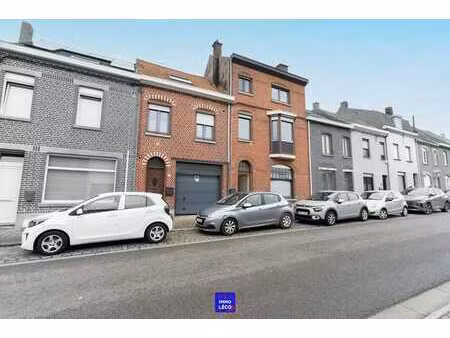 immeuble de rapport : 3 logements et grand garage  idéal in
