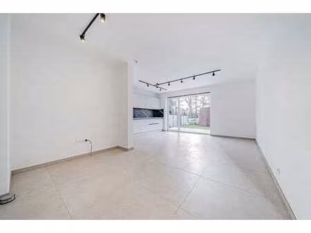 appartement rez 1ch neuf + terrasse  jardin  parking