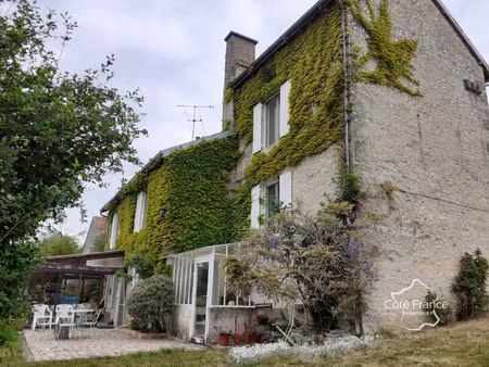 charmante maison de village avec vérandas  garage double et