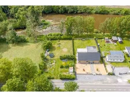 terrain en zone de loisirs au bord de l'eau à halleux