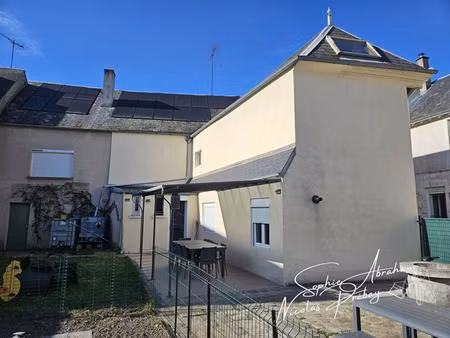 maison en centre ville avec jardin  terrasse et places de parkings privatives