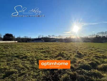 terrain viabilisé de 965 m² à artigueloutan (64420) - proche pau- nay