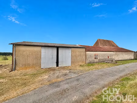 ensemble immobilier avec grange et bâtiment agricole proche d'orthez