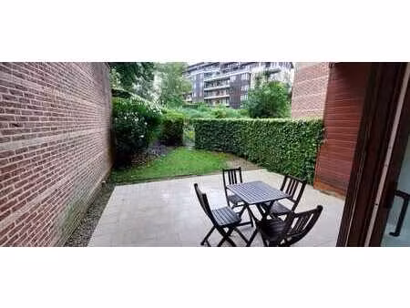 appt rdc meublé  2 chambres  terrasse  jardinet  parking