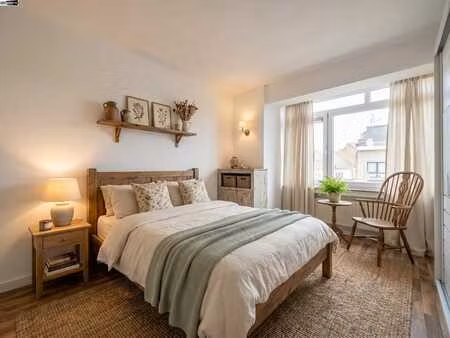 au dernier niveau de l'immeuble  découvrez un appartement of