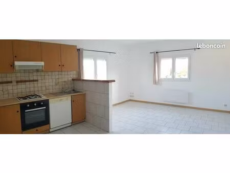 appartement 40 m² - très bon état - avec cave et place de stationnement