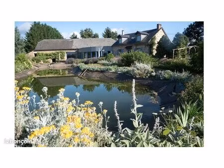 maison avec salle polyvalente de 100m2