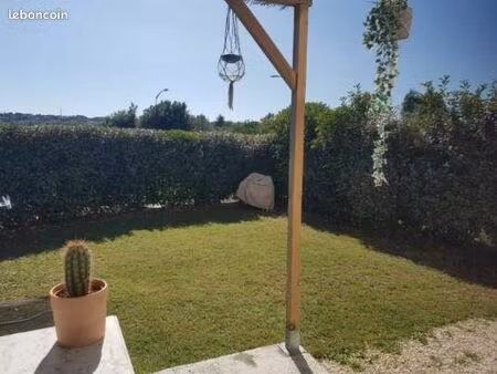 appartement t2  jardinet-terrasse + 2 parkings  dans résidence r+1 sécurisée