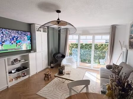 appartement 57 m2 en rez-de-chaussée