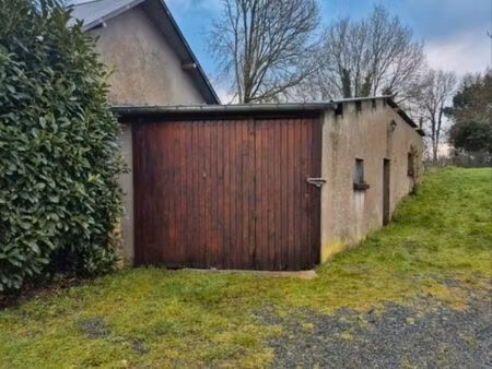 hangar + jardin 700m²
