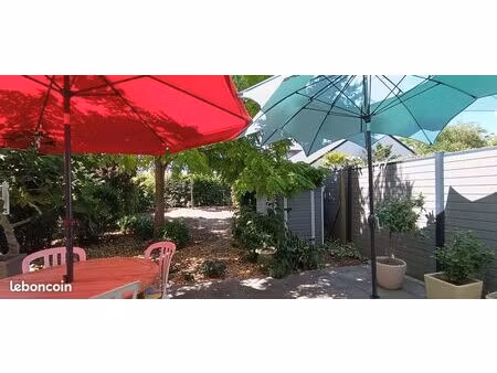 maison basse consommation avec garage et jardin arboré à sainte-luce-sur-loire