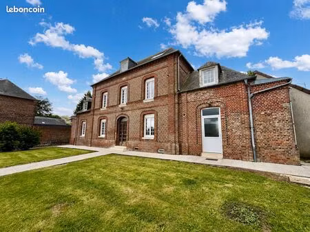 immeuble 7 appartements + 3 garages + terrain constructible