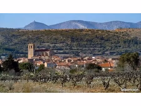 terrain 409 m² baixas