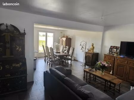 appartement t3 de 69 m² en rez-de-chaussée avec 2 chambres et jardin privatif