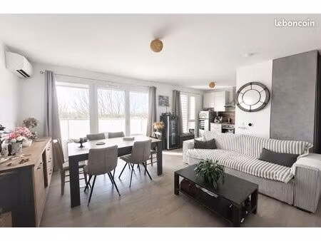 appartement t2+2 caves+ stationnement