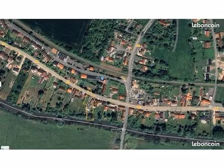 terrain 1000 m² – axe très passant
