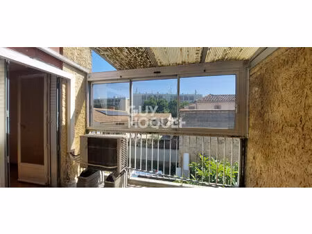 appartement t3 de 63 m² (61.62 m² loi carrez) - 2 chambres - terrasse - cave et stationnem
