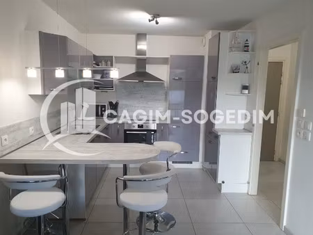 à vendre f2 moderne avec terrasse  garage et parking rés