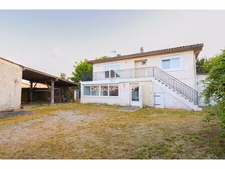 charmante maison familiale de 5 pièces avec jardin au cœur de saint-julien-beychevelle