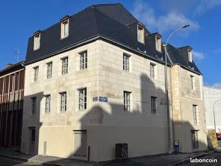 charmant t2 avec balcon dans un ancien moulin réhabilité – proche centre-ville et gare