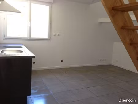 f2 duplex avec cave et parking