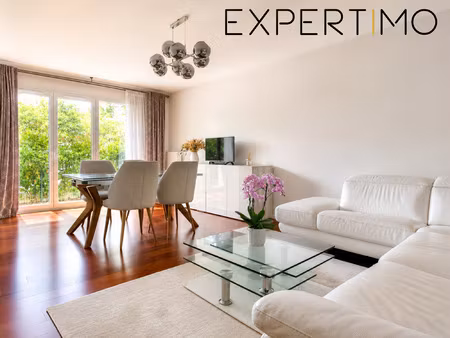 appartment rez-de-jardin 69m2 - cave - place de prking - st