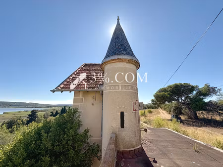 grande propriété à rénover vue exceptionnelle sur l'étang  le village pittoresque de bages