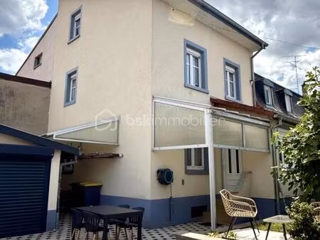 maison de cité 4 pièces avec cour  garage et confort moderne