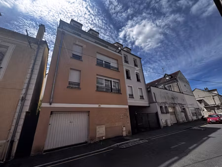 f2 en rez-de-jardin avec parking