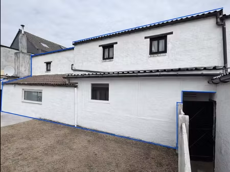 te renoveren halfopen woning met grote naastliggende tuin