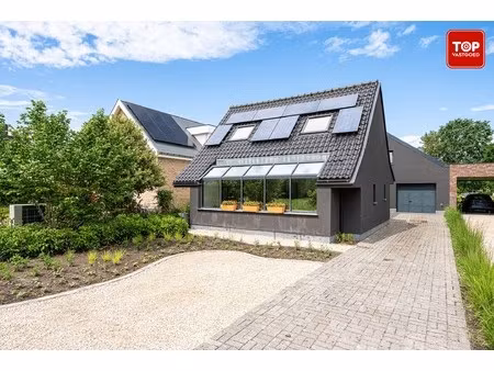 gerenoveerde gezinswoning met garage en ruime tuin