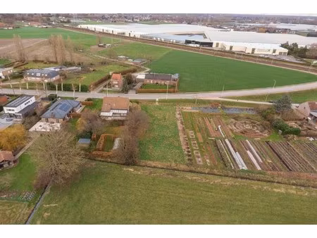 perceel villagrond van 1083m2 & zuid-tuin