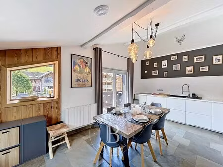 les gets - appartement familial - 9 couchages - centre village - vue pistes