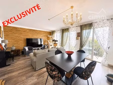 appartement t4 rénové de 90 m² avec balcon  cave et parking