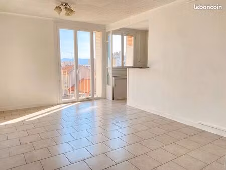 t3 traversant 53 m² balcon et cave