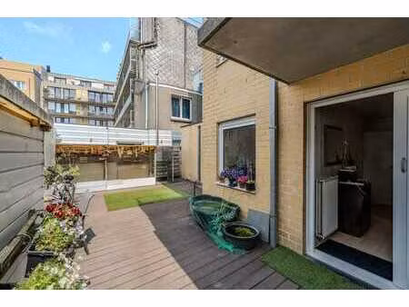 appartement au rez-de-chaussée avec terrasse ensoleillée (40