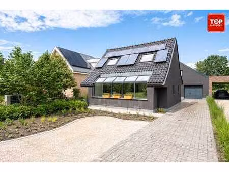 gerenoveerde gezinswoning met garage en ruime tuin