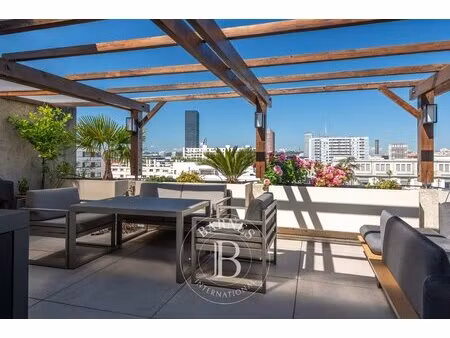 lyon 3ème - part-dieu - appartement toit-terrasse de 110 57 m² - 2 chambres poss. 3 - gara